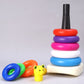 Close-up of the educational teddy bear stacking rings in various bright colors.