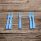The set of heavy duty reusable plastic forks with a focus on their practical design for everyday use.