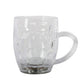Group of rainbow LED glass cups illuminating a festive party setting.