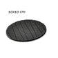 A plain round silicone coaster with a mug of hot coffee, preventing heat damage.