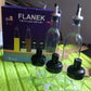 Stylish glass oil dispenser and spice jar set complementing a kitchen decor.