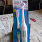BrushedUp Electric Toothbrush with extra brush heads for extended use.