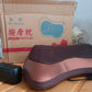 Another angle of the Velvet Wellness Professional Massage Pillow ready for use.