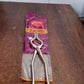 Heavy-duty full round stainless steel pakkad tong in kitchen setting