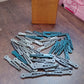 An image illustrating the compact size and easy storage of the 36 Pcs plastic cloth pegs.