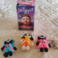 Flexible silicone character keychain secured by metal ring