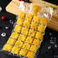 Multiple self-sealing disposable ice cube bags being filled with water for freezing.