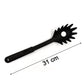 Detailed view of the head of a black heat-resistant pasta server, showing the tapered edge.