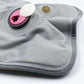 Detailed view of the electric heating pad's soft cloth material for soothing warmth.