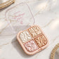 Swatches of highlighter palette shades with pearl, gold, rose, bronze
