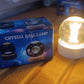 The Moon Crystal Ball Lamp glowing softly, ideal as a 3D night light for relaxation.