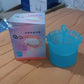 Close-up image of Micro Bubble Foaming Face Cleanser Cup with mesh whisk inside