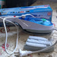 All components of the Portable Garment Steamer set, including accessories.