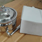 Isolated view of the Stainless Steel Ghee Pot, highlighting its sleek design.