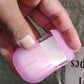 Travel paper soap sheets in various colors spread on flat surface