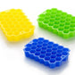 Vibrant multicolor silicone ice cube trays stacked for storage.