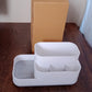 Plastic multipurpose organizer holder neatly arranged on a wooden desk.