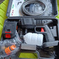 The complete portable pressure washer kit neatly packed in its durable plastic box.