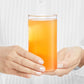 Close-up of a single clear plastic glass, emphasizing its smooth finish.