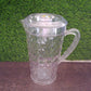 Clear Mocktail PET Plastic Jug with a vibrant orange slice inside, suggesting a refreshing drink.