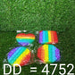 Rainbow colored fidget toy held in hand showing bubble detail