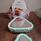 Ganesh Trinity lunch box set packaging showing compact triangle design