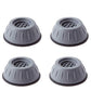 Four washer dryer vibration pads placed on floor surface