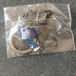 Cartoon character keychain hanging as bag accessory
