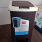 Comparison image of Apex Push N Pedal Dust Bin next to other household bins for size reference