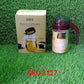 Plastic oil container with a small nozzle for controlled flow.