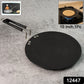 Flat roti tawa heating evenly on gas stove burner