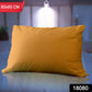 Close-up of the durable fabric and invisible zipper on a couch pillow cover.