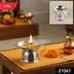 Close-up view of stainless steel agarbatti holder with diamond design