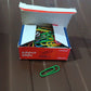 Documents of various colors held firmly with metal U-shape 28mm paper clips