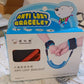 Packaging of the Mini Safy Baby Safety Harness, highlighting its key features.