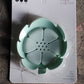 Back view of the plastic soap dish showing its draining holes.