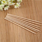 Neatly bundled bamboo BBQ skewers, ready for grilling meat and vegetables.