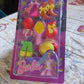 Overhead view of a diverse collection of Mini Erasers for Kids on a clean background.