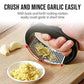 A hand demonstrating the easy-to-use rocking motion of the garlic press for mincing.