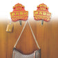 An illustrative diagram detailing the simple 3-step installation for self-adhesive wall hooks.