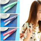 A hand holding the compact ceramic mini hair styler, showcasing its portable design.