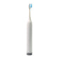 Hand holding the ergonomic BrushedUp Electric Toothbrush, demonstrating comfortable grip.
