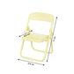 Sleek chair-shaped phone holder for convenient hands-free mobile usage.