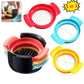 Hand using the egg slicer to cut soft fruits like strawberries and bananas for salads.