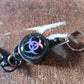 Retractable key chain attached to a belt, ideal for travel and office use.
