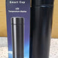 Side angle of black vacuum insulated water bottle with LED temperature display