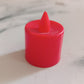 Red LED tea light diya, showcasing its simple ON/OFF switch at the base.