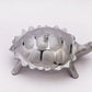 Stylish tortoise-shaped container, ideal for serving snacks.