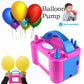 The electric balloon pump shown with a few inflated balloons for scale.
