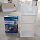 Lifestyle image showing the 4-layer plastic wardrobe drawer organizer in a home setting.